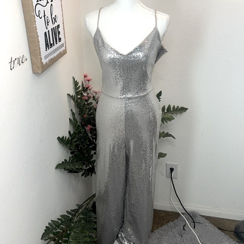 Bebe sequin jumpsuit with drape back